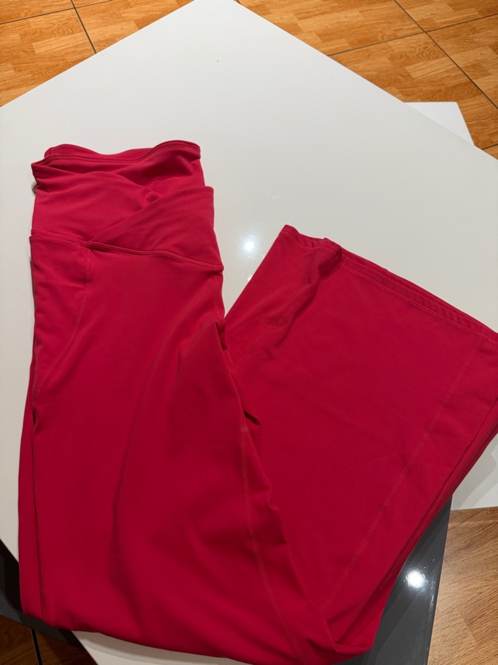 Fabletics Oasis PureLuxe High-Waisted Crossover Flare in raspberry fizz - 2x
